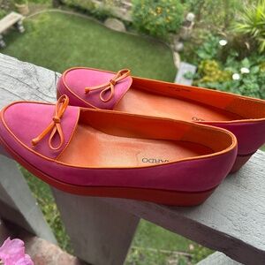 Really cute pink shoes with orange trim